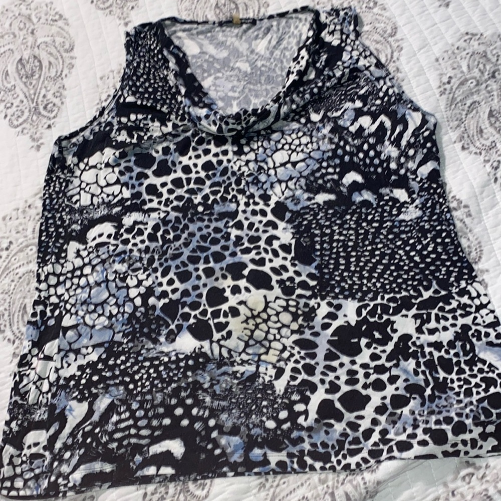 Sleeveless blouse very lightly worn